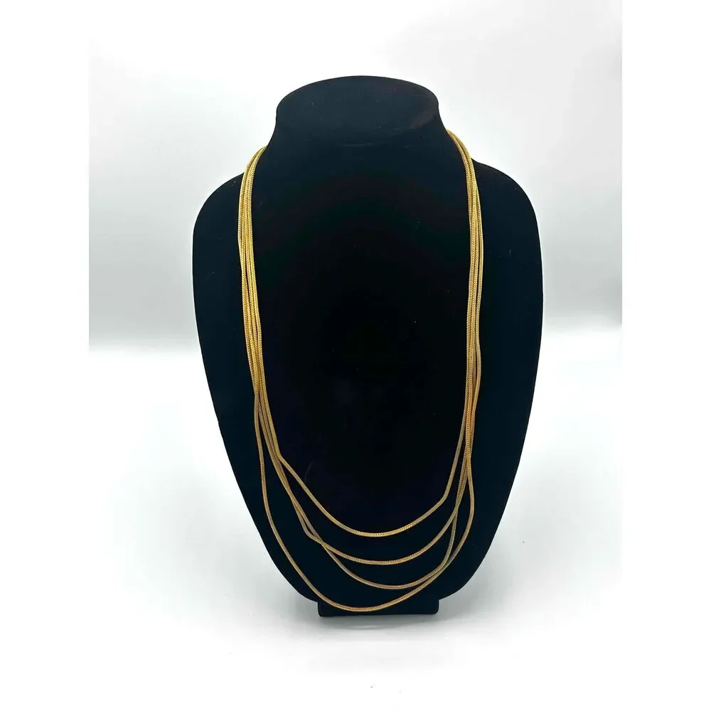 Gold Tone Multi Strand Necklace With Layered Snake Chain